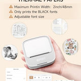 iDPRT portable mini thermal sticker printer in white shown with included roll of thermal sticker paper on white background - view 7