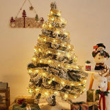 Yummuely 33ft gold foil Christmas ribbon fairy lights with 100 warm white LEDs wrapped around a holiday tree - view 7