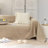 Khaki chenille slipcover with tassel fringe edges draped over a single-cushion chair, 71x71 inch furniture cover - view 8