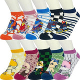 Ten pairs of colorful monster and anime cat character low-cut ankle socks laid flat, assorted multicolor designs
