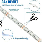 Supernight 32.8ft RGB LED strip lights with 300 LEDs glowing in multiple colors mounted behind a bedroom TV - view 2