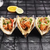 Four stainless steel taco holder racks arranged together, each holding three taco shells upright, 304 steel silver finish - view 6