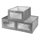 Three grey linen foldable fabric storage bins with clear window, 15.74 inches long, standing upright on a shelf - view 3