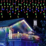 HISHINY 32ft multicolor LED icicle Christmas lights with 72 hanging drops displayed outdoors on roofline at night