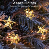 30 clear plastic star and snowflake clips for Govee Christmas string lights, 15 of each shape, spread on white surface - view 6