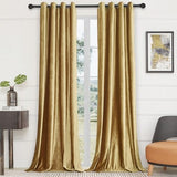 Two gold velvet blackout curtain panels 52x84 inches with silver grommets hanging on a rod in a living room - view 5