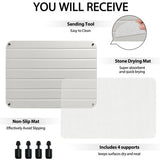 White diatomite stone dish drying mat 12x16 inches with drainage grooves and anti-slip PVC mesh base on kitchen counter - view 2