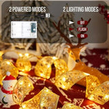 Yummuely 33ft gold foil Christmas ribbon fairy lights with 100 warm white LEDs wrapped around a holiday tree - view 5