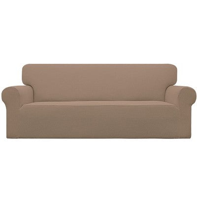 Easy-Going camel check jacquard stretch slipcover fitted snugly over a three-seat sofa with elastic base secured