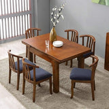 Four navy blue stretch dining chair slipcovers with rhombic jacquard pattern and elastic anti-slip straps, laid flat - view 2