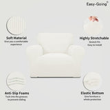 Cream check jacquard stretch slipcover fitted over a standard armchair, showing elastic base and snug one-piece fit - view 2