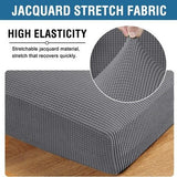 Two grey jacquard stretch sofa seat cushion covers laid flat showing textured twill pattern and elastic loops underneath - view 4
