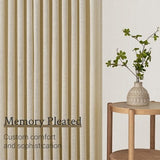 Two natural beige pinch pleat semi-sheer linen blend curtain panels 40x92 inches hanging on a window rod - view 4