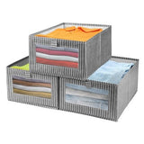 Three grey linen foldable fabric storage bins with clear window, 15.74 inches long, standing upright on a shelf - view 2