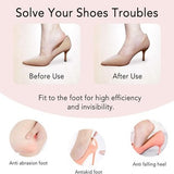 Four OKGL black and yellow self-adhesive heel grip inserts laid flat showing cushioned sponge side and anti-slip surface - view 6