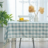 Aqua and white buffalo plaid cotton tablecloth with corner tassels on a large rectangular dining table, 55x102 inches - view 5