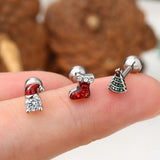 OUFER 3-piece Christmas cartilage stud earrings set featuring Santa hat, shoe, and pine tree designs in surgical steel - view 4