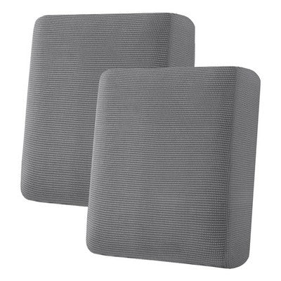 Two grey jacquard stretch sofa seat cushion covers laid flat showing textured twill pattern and elastic loops underneath