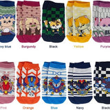 Ten pairs of colorful monster and anime cat character low-cut ankle socks laid flat, assorted multicolor designs - view 5