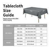 Dark grey rectangular faux linen tablecloth 60x120 inches with pleated corners draped over a dining table, waterproof stain resistant - view 6
