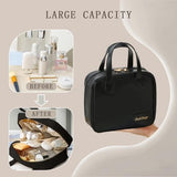 YNGVE black PU leather makeup bag with zipper closure and handle, compact travel toiletry organizer 8.27x3.15x7.48 inches - view 4