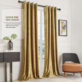 Two gold velvet blackout curtain panels 52x84 inches with silver grommets hanging on a rod in a living room - view 8