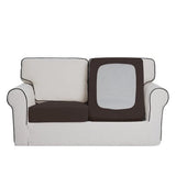 Set of two chocolate brown stretch fabric loveseat cushion covers with elasticized bottom, laid flat showing fitted shape