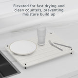 White diatomite stone dish drying mat 12x16 inches with drainage grooves and anti-slip PVC mesh base on kitchen counter - view 7