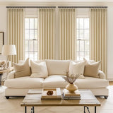 Two natural beige pinch pleat semi-sheer linen blend curtain panels 40x92 inches hanging on a window rod - view 6