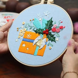 Gogobear Christmas embroidery kit with 7.9-inch bamboo hoop, pre-printed holiday fabric, colorful threads, and needles - view 3