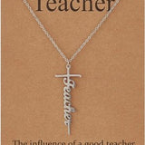 Silver stainless steel cross pendant necklace with Teacher inscription on 18-inch chain with inspirational gift card