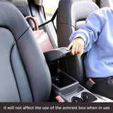 Black faux leather car handbag holder wedged between front seats to keep purse secure while driving - view 6