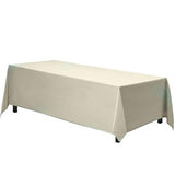 Ivory rectangle polyester tablecloth 90x156 inches draped floor length over an 8-foot banquet table