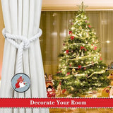 Two white cotton rope curtain tiebacks with handmade Santa Claus patterns, laid flat on a holiday-decorated surface - view 6