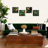 Four emerald green and gold leaf tropical botanical canvas prints 12x12 inches on wood frames arranged as a gallery wall set - view 3