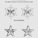 30 clear plastic star and snowflake clips for Govee Christmas string lights, 15 of each shape, spread on white surface - view 2