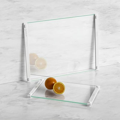 LANGBOHOS 2-piece clear tempered glass cutting board set, 12x16 and 12x8 inches, with white silicone grip edges on kitchen counter