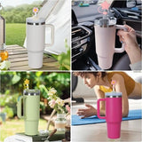 Eight hot pink star-shaped silicone straw covers displayed near Stanley tumblers, dust-proof reusable straw toppers - view 6