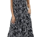Women's black and white floral boho maxi dress with V-neckline, adjustable spaghetti straps, and side pockets in rayon - view 4