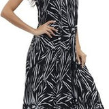 Women's black and white floral boho maxi dress with V-neckline, adjustable spaghetti straps, and side pockets in rayon - view 2