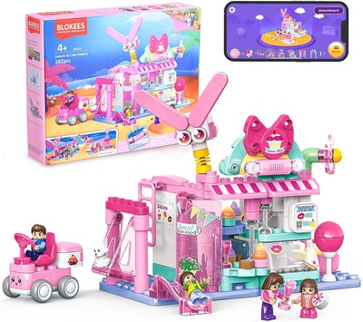 Blokees 184-piece STEM bakery building blocks set showing assembled dessert shop with rabbit and small lamps, multicolor ABS pieces