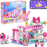 Blokees 184-piece STEM bakery building blocks set showing assembled dessert shop with rabbit and small lamps, multicolor ABS pieces
