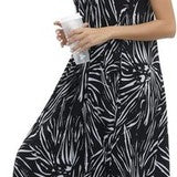 Women's black and white floral boho maxi dress with V-neck, adjustable spaghetti straps, and side pockets in size 2XL - view 3