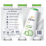 Three 23 oz bottles of Dove Cucumber & Green Tea Body Wash in white packaging with green accents - view 2