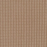 Easy-Going camel check jacquard stretch slipcover fitted snugly over a three-seat sofa with elastic base secured - view 5