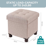 Small square khaki linen storage ottoman with wood legs and reversible lid, 12.6 inches, folded flat beside a living room sofa - view 3