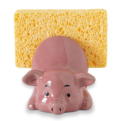 Pink glossy ceramic pig-shaped kitchen sponge holder on countertop, farmhouse style, GABROC brand