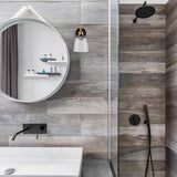 Linea Di Liara Fiorentino matte black and antique brass wall sconce with clear glass shade and LED filament bulb - view 3