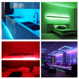 DAYBETTER 100ft RGB LED strip lights kit with remote control showing multicolor lighting installed in bedroom - view 7