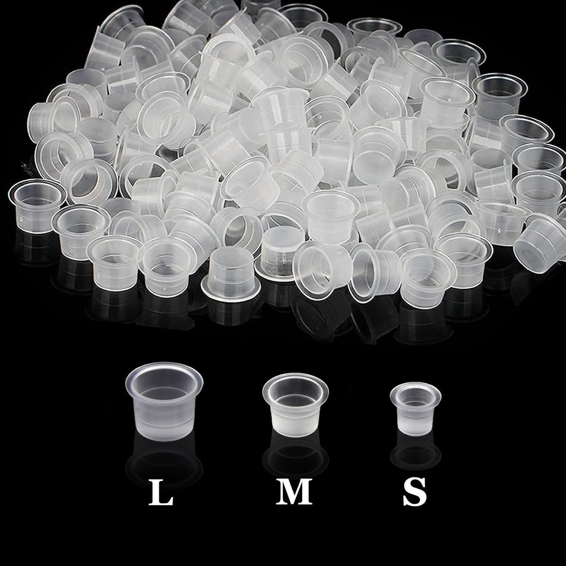 300 clear disposable plastic tattoo ink cups in small, medium, and large sizes arranged together, Urknall brand pigment caps